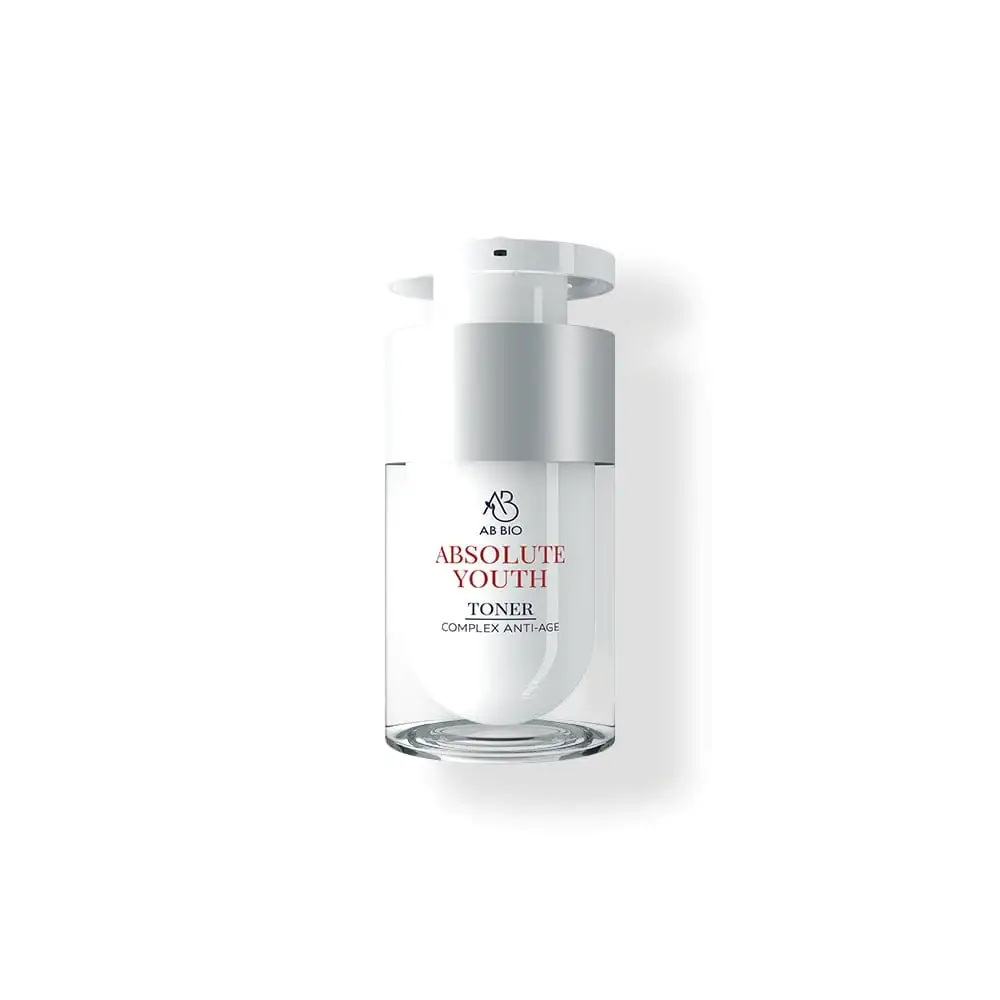 Woman applying natural skincare product for a youthful glow